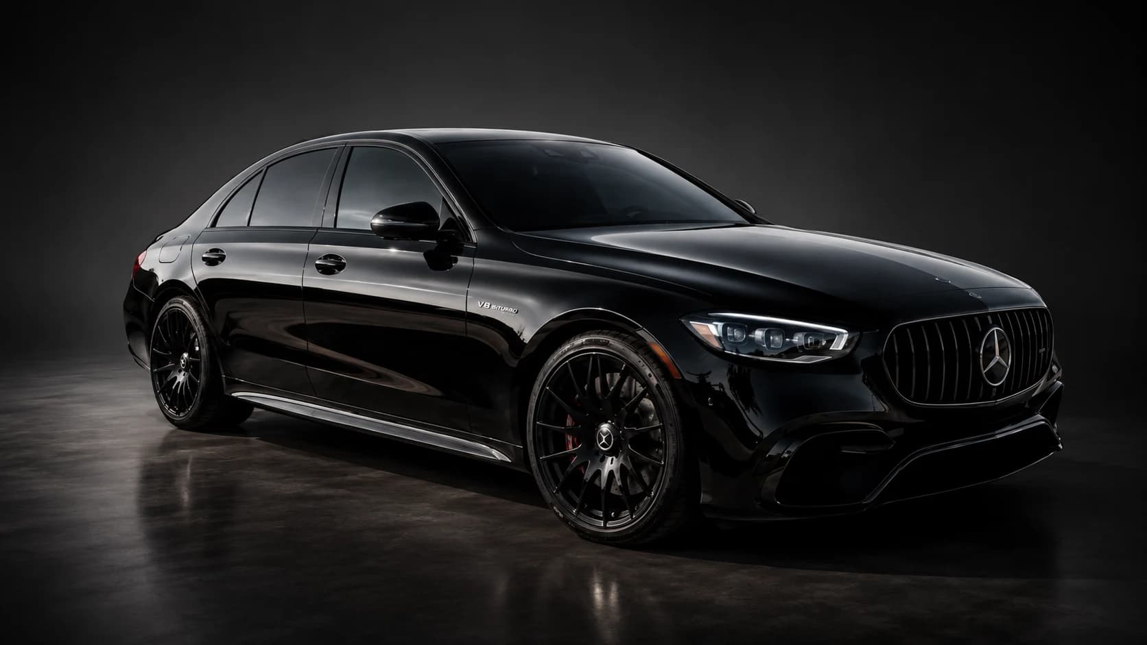 Black Mercedes performance sedan in a dark studio, supplied by AutoWorks for the homepage hero